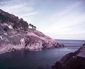 Cornish Fishing Village Stampe: Cliffs at Polperro, Cornwall, c1955. Creator: Arthur Charles Kirby Ware