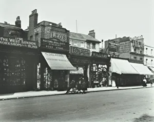 Kensington High Street History Stampe: Row of shops including the West London Workshops for the Blind, London, 1913