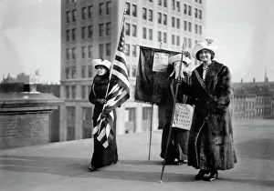 American Suffrage Movement Stampe: Suffragettes with flag, between c1910 and c1915. Creator: Bain News Service