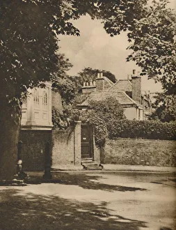 London Landscape Photography Stampe: Sunlight and Shadow in a Winding Highgate Road, c1935. Creator: Paterson