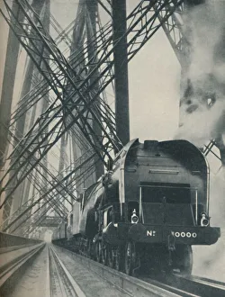 Steam Locomotive Photography Stampe: Four Hundred Tons of Train Pulled By A Leviathan, c1935. Artist: Global Photographic Union