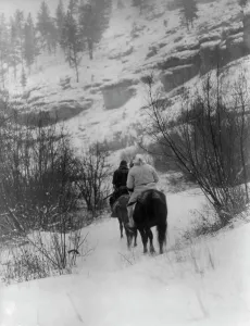 Black And White Winter Landscape Stampe: Winter hunter[s]-Apsaroke, c1908. Creator: Edward Sheriff Curtis