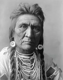 Traditional Tribal Clothing Stampe: Wolf, c1908. Creator: Edward Sheriff Curtis