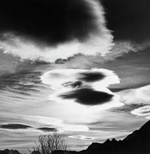 Mountain Cloud Formations Stampe: Clouds over a mountain landscape