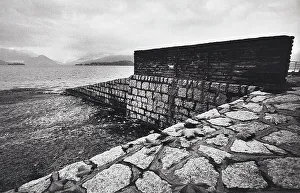 Natural Coastal Scenery Stampe: View of the beach with wall