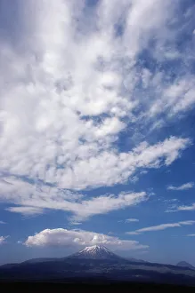 Tranquil Nature Scenes Stampe: Clouds over a snowcapped mountain