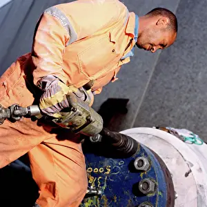 Stampe di Lavoratore edile che utilizza un trapano pneumatico 2004 Stampe: Lavoratore edile che utilizza un trapano pneumatico.