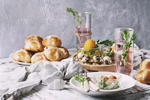 Easter Celebration Ideas Stampe: Easter table setting with colored orange eggs
