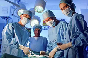 Operating Room Staff Stampe: MODEL RELEASED. Surgery