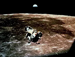 Apollo 11 Lunar Module Stampe: A view of the Apollo 11 lunar module Eagle as it returned from the surface of the moon to dock with the command module