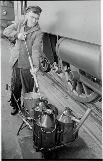Swedish Railway Museum Stampe: Workshop worker with lubrication