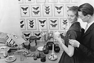 Young Adults In Love Stampe: In the 1950s. A young with the typical 1950s designed objects