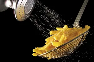 High Calorie Snacks Stampe: Adding salt to chips