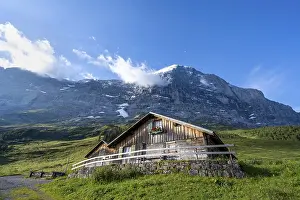 Bernese Oberland Scenery Stampe: Alpine hut and summit of the Eiger