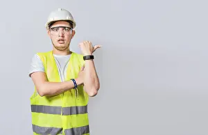 Construction Worker Pointing Stampe: Amazed Engineer pointing to side