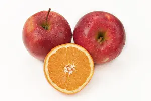 Balanced Diet Stock Photos Stampe: Two apples and one orange slice