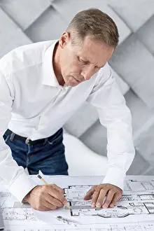 Scientific Researcher Stampe: Architect working complex plan