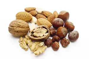 Hazelnut Nutrition Facts Stampe: Assorted nuts - walnuts, hazelnuts and almonds