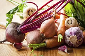 Orange Colored Vegetables Stampe: Assorted types of root vegetables