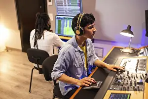 Studio Recording Session Stampe: Two audio engineers work in a recording studio