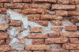 Ornate Stucco Decoration Stampe: Background of an old brick wall texture