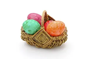 Resurrection Symbolism Stampe: Basket with coloured Easter Eggs