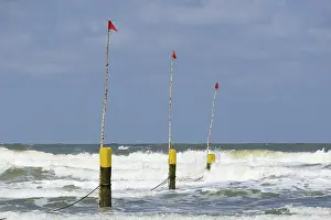 Deserted Sandy Beach Scene Stampe: Beach limit marker posts, Norderney