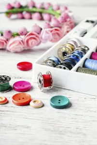 Needlework Supplies Stampe: Beads, thread and bobbins for needlework