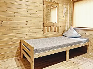 Interior Space Photo Stampe: Bed in the Corner of the Bedroom