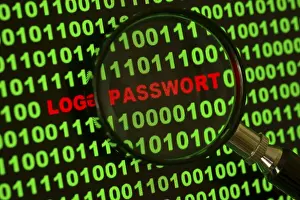 Computer Hacking Crime Stampe: Binary code with the words 'Login Passwort' viewed through a magnifying glass Binary code with the words