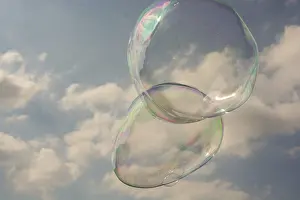 Soap Bubble Stampe: Blown soap bubbles float in air in view