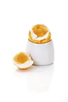 Boiled Egg Nutrition Stampe: Boiled breakfast easter egg in an egg cup