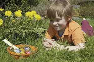 Easter Egg Hunt Stampe: Boy found Easter eggs in Easter basket