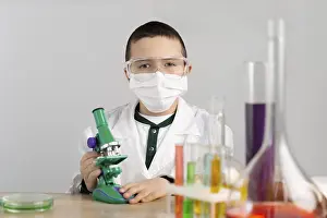 Test Tube Experiment Stampe: Boy laboratory with microscope