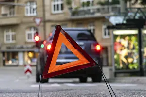 Empty Roads In Southern Germany Stampe: Breakdown vehicle with warning triangle