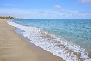 Spanish Coast Stampe: Breaking waves on a sandy beach