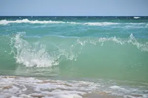 Spanish Coast Stampe: Breaking waves on a sandy beach