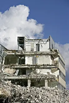 Demolition Site Stampe: Building in the process of being torn down, debris