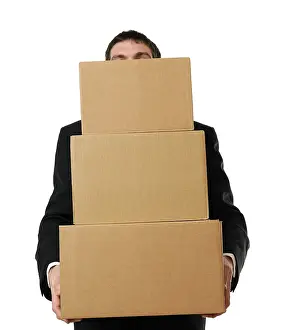 Caucasian Male In Studio Shot Stampe: Businessman overloaded with a stack of boxes