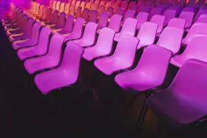 Interior Decoration Ideas Stampe: A captivating array of pink chairs in neat rows