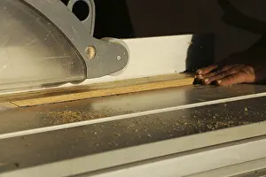 Woodworking Industry Stampe: Carpenter at work in his carpentry workshop