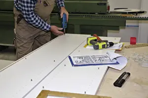 Carpenter At Work Stampe: Carpenter at work in his carpentry workshop