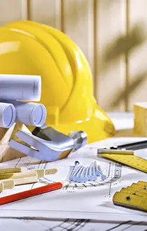 Construction Industry Equipment Stampe: Carpentry tools on table with blueprints