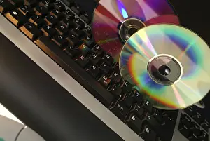 Computer Keyboard Stampe: Cd romes on computer keyboard