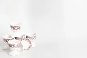 Bright Studio Background Stampe: Ceramic egg cup with reddish pattern on white background