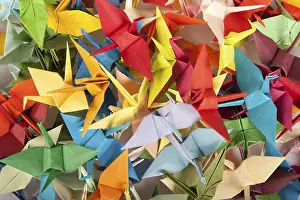 Colorful Bird Photography Stampe: A chaotic array of multicolored origami cranes overlapping each other