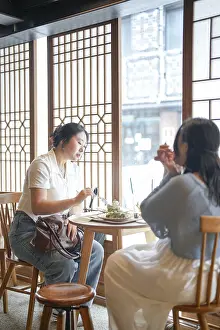 Seoul Cityscape Photography Stampe: In a chic cafe by a window table