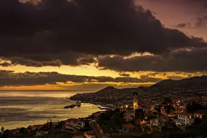 Funchal Cityscape Stampe: Cityscape at sunset, dramatic cloudy sky