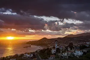 Funchal Cityscape Stampe: Cityscape at sunset, dramatic cloudy sky