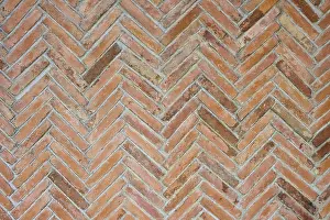 Deserted European Structure Stampe: Close-up of a brick wall with a zigzag pattern